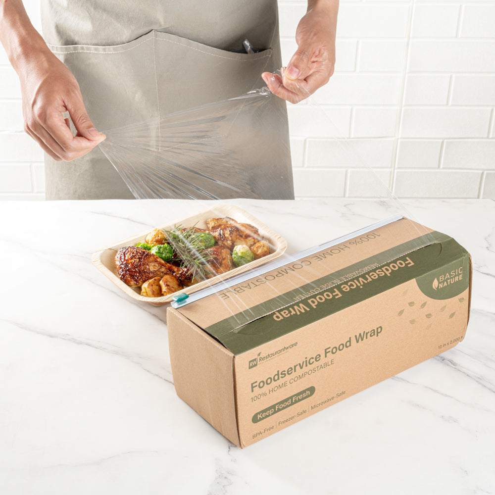Basic Nature Clear Plastic Foodservice Food Wrap - Home Compostable, BPA-Free, Microwave-Safe - 12" x 2000' - 1 count box