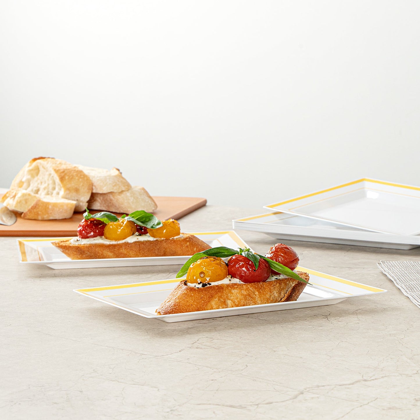Moderna Rectangle White Plastic Gold-Rimmed Plate - 7 1/2" x 5 1/4" x 1/2" - 10 count box