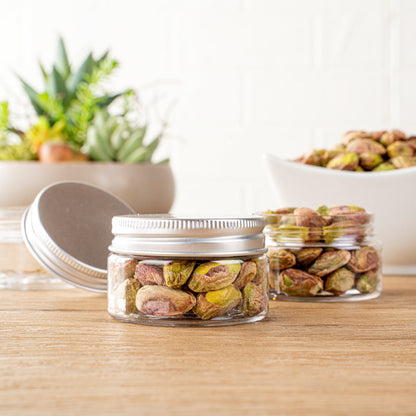 Chef 101 1 oz Round Clear Plastic Candy and Snack Jar - with Silver Aluminum Lid - 2" x 2" x 1 1/4" - 10 count box