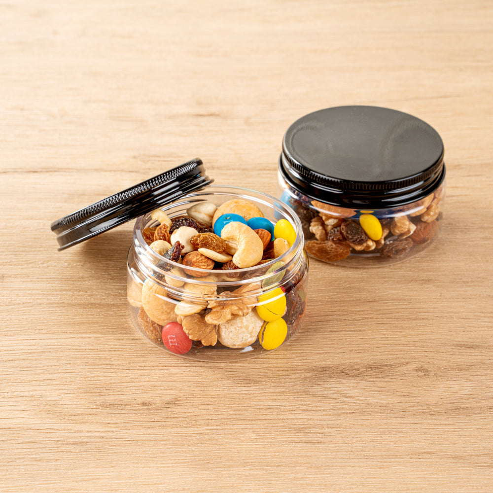 Chef 101 4 oz Round Clear Plastic Candy and Snack Jar - with Black Aluminum Lid - 2 3/4" x 2 3/4" x 1 1/2" - 10 count box