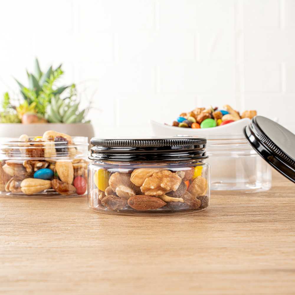 Chef 101 4 oz Round Clear Plastic Candy and Snack Jar - with Black Aluminum Lid - 2 3/4" x 2 3/4" x 1 1/2" - 100 count box