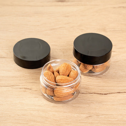 Chef 101 1 oz Round Clear Plastic Candy and Snack Jar - with Black Plastic Lid - 2" x 2" x 1 1/4" - 10 count box