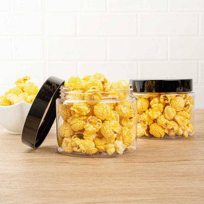 Chef 101 16 oz Round Clear Plastic Candy and Snack Jar - with Black Plastic Lid - 3 3/4" x 3 3/4" x 3" - 100 count box