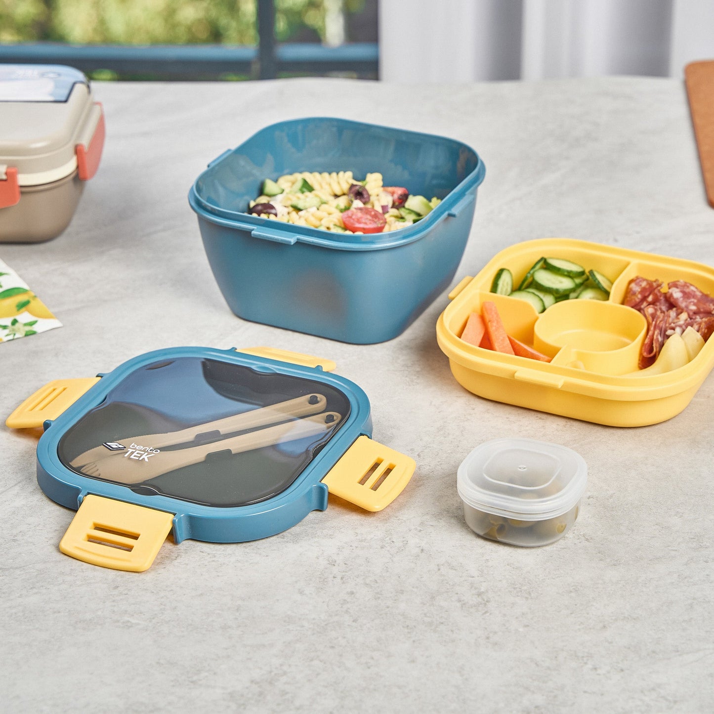 Bento Tek 58 oz Blue and Yellow Lunch Box - BPA-Free, Microwave-Safe, with Fork and Knife - 7 1/4" x 7 1/4" x 4 1/4" - 10 count box
