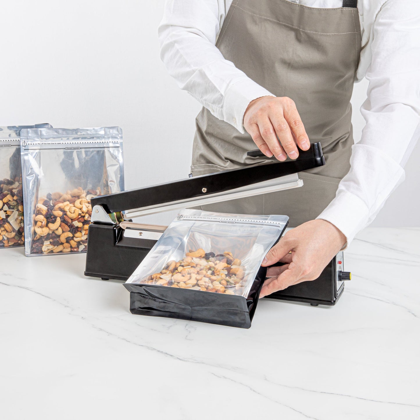 Fresh Hero Black Aluminum Hand Impulse Sealer - Industrial Grade, Food Safe - 17 3/4" x 3 1/4" x 10" - 1 count box