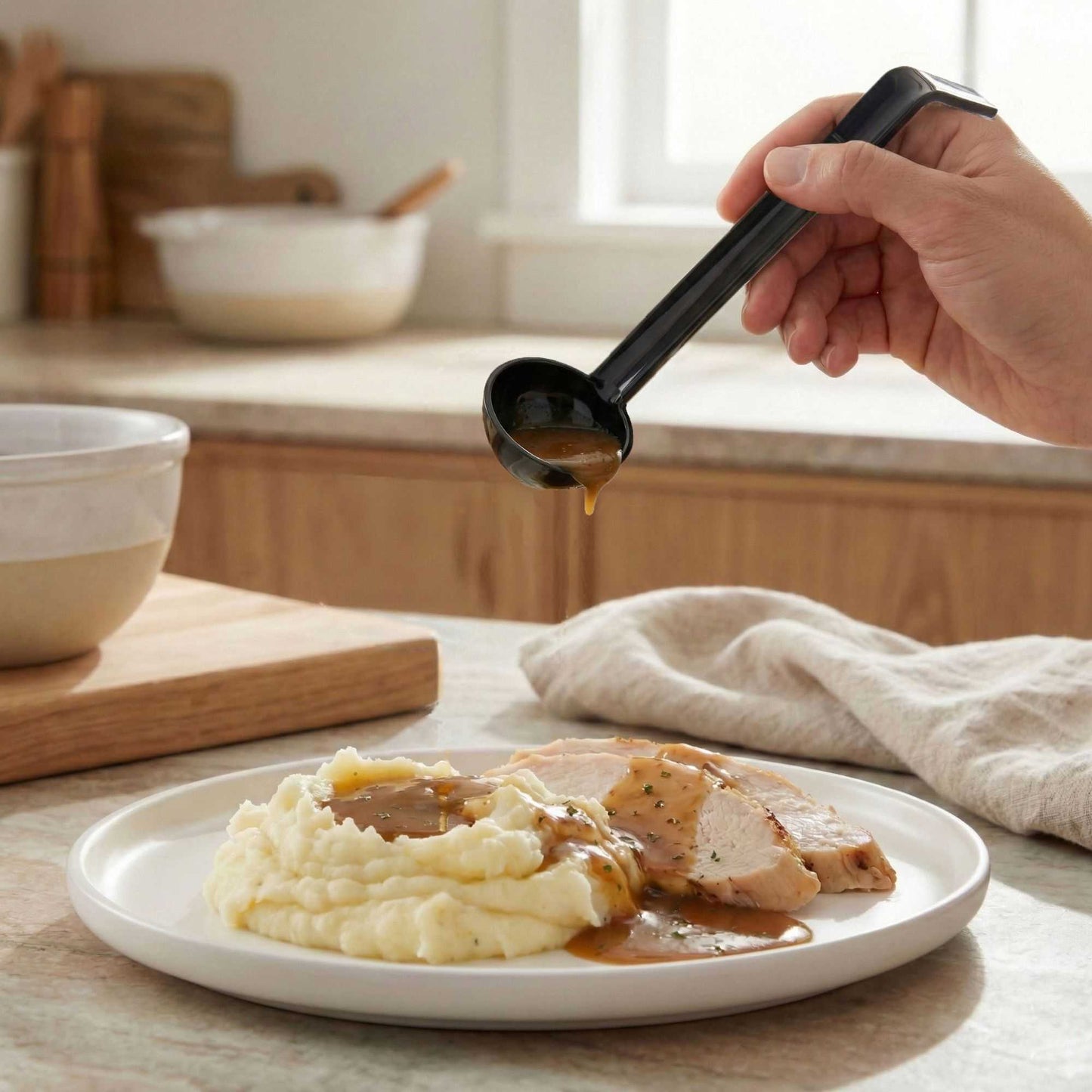 Voga 1 oz Black Plastic Sauce Ladle - 8 1/2" - 1 count box