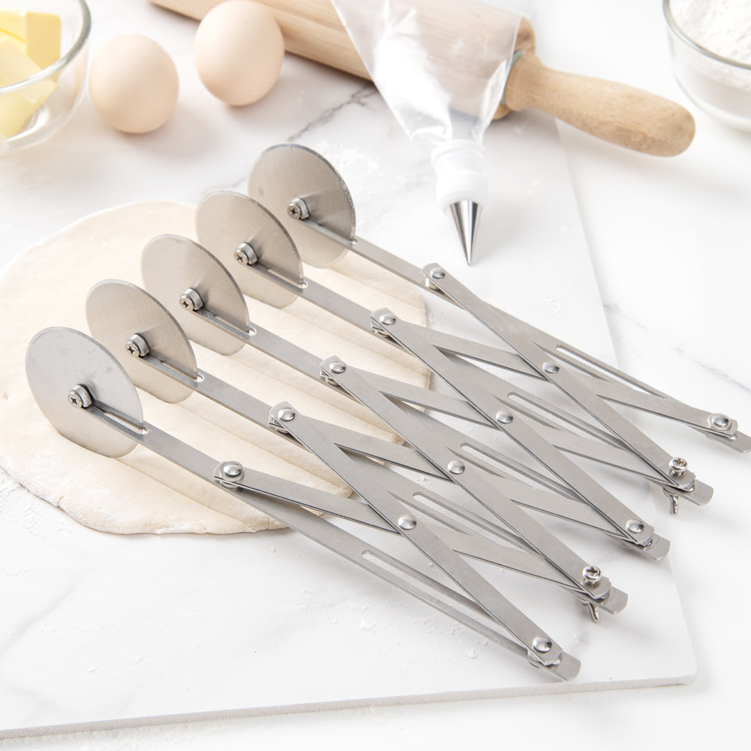 Met Lux Stainless Steel 5-Wheel Pastry Cutter - 2 1/4" Blades - 9 1/2" x 9 1/2" x 2 1/4" - 1 count box