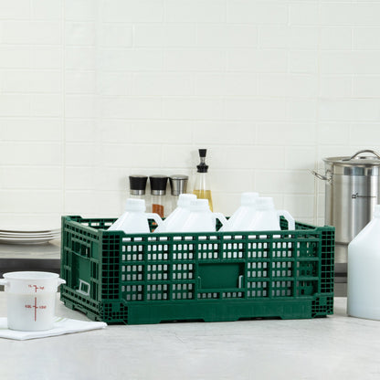 Cater Tek Rectangle Green Plastic 36L Collapsible Milk Crate - Stackable - 23 1/2" x 15 3/4" x 8 1/2" - 1 count box