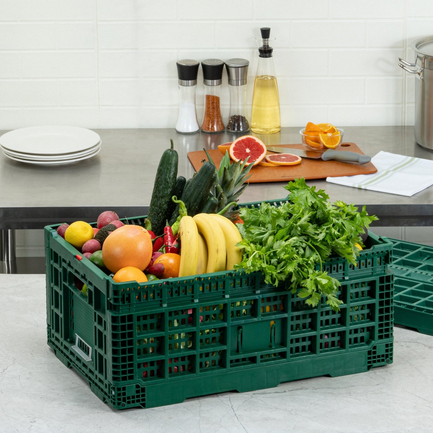 Cater Tek Rectangle Green Plastic 43L Collapsible Milk Crate - Stackable - 23 1/2" x 15 3/4" x 10 1/4" - 1 count box