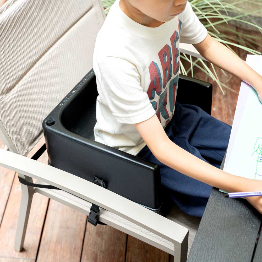 Table Tek Black Plastic Booster Seat - Dual Height, with Strap - 12 1/2" x 8 3/4" - 1 count box