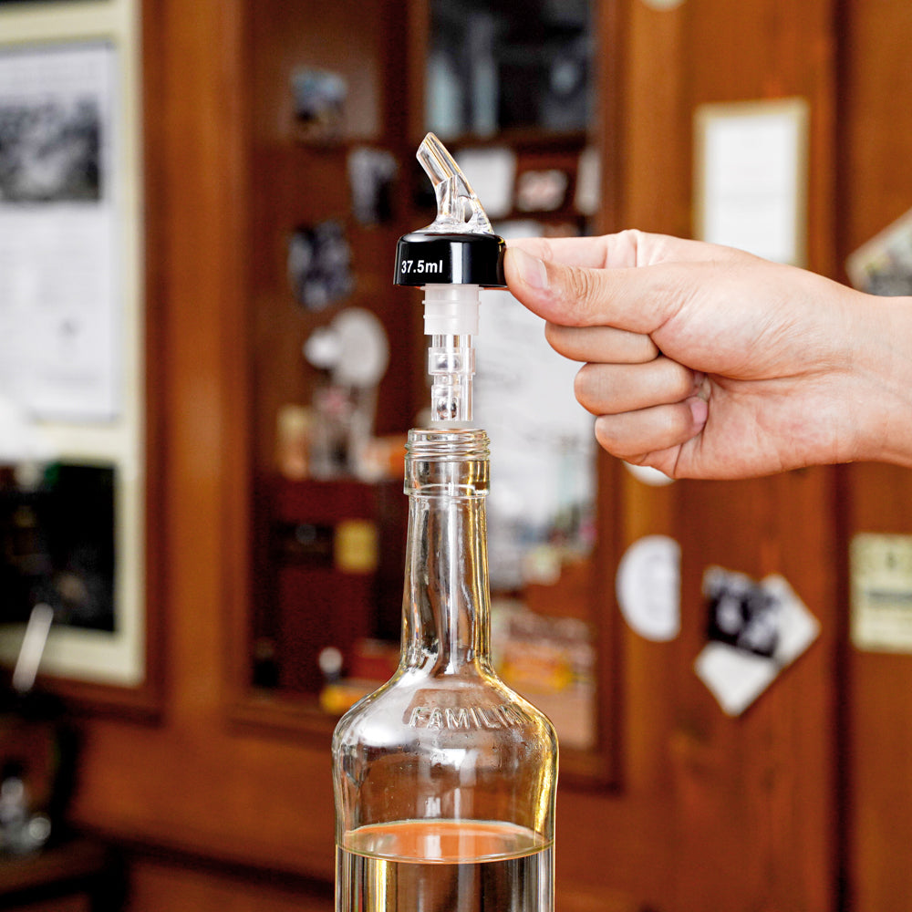 Bar Lux 1 oz Clear Plastic Measured Liquor Pourer - with Collar - 1 1/2" x 1 1/2" x 3 3/4" - 10 count box