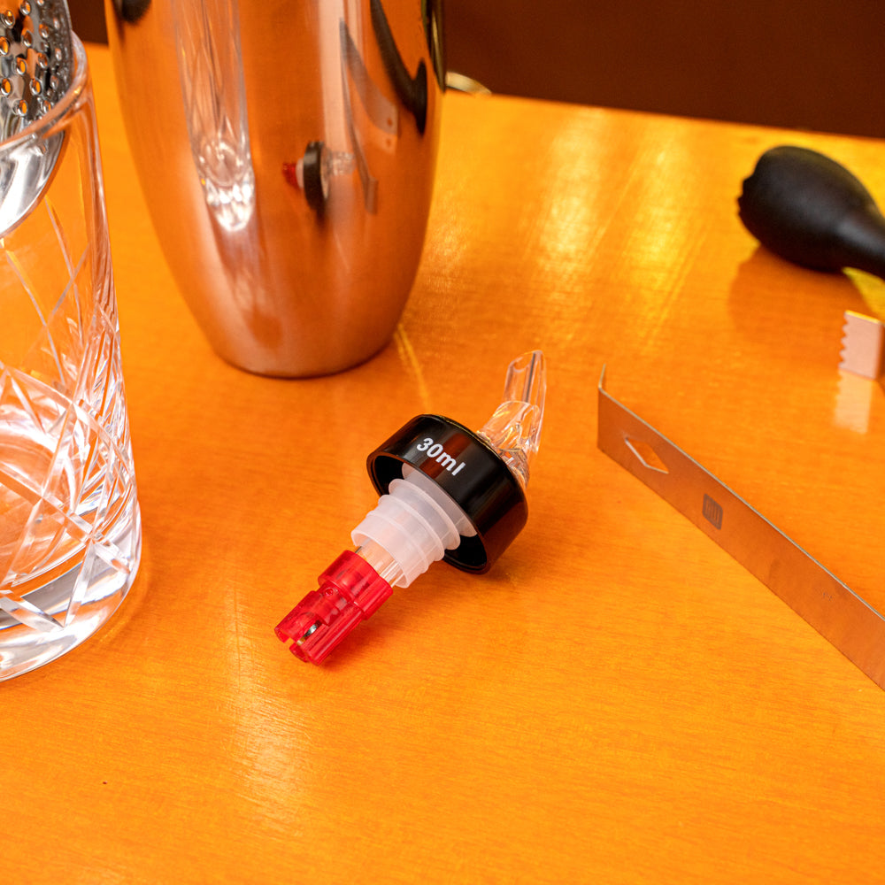 Bar Lux 1 oz Red Plastic Measured Liquor Pourer - with Collar, Clear Spout - 1 1/2" x 1 1/2" x 3 3/4" - 10 count box
