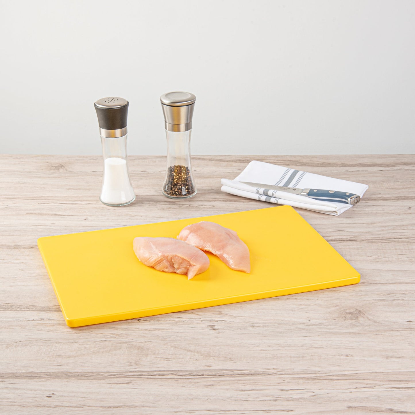 Chef 101 Yellow Plastic Cutting Board - 18" x 12" - 1 count box