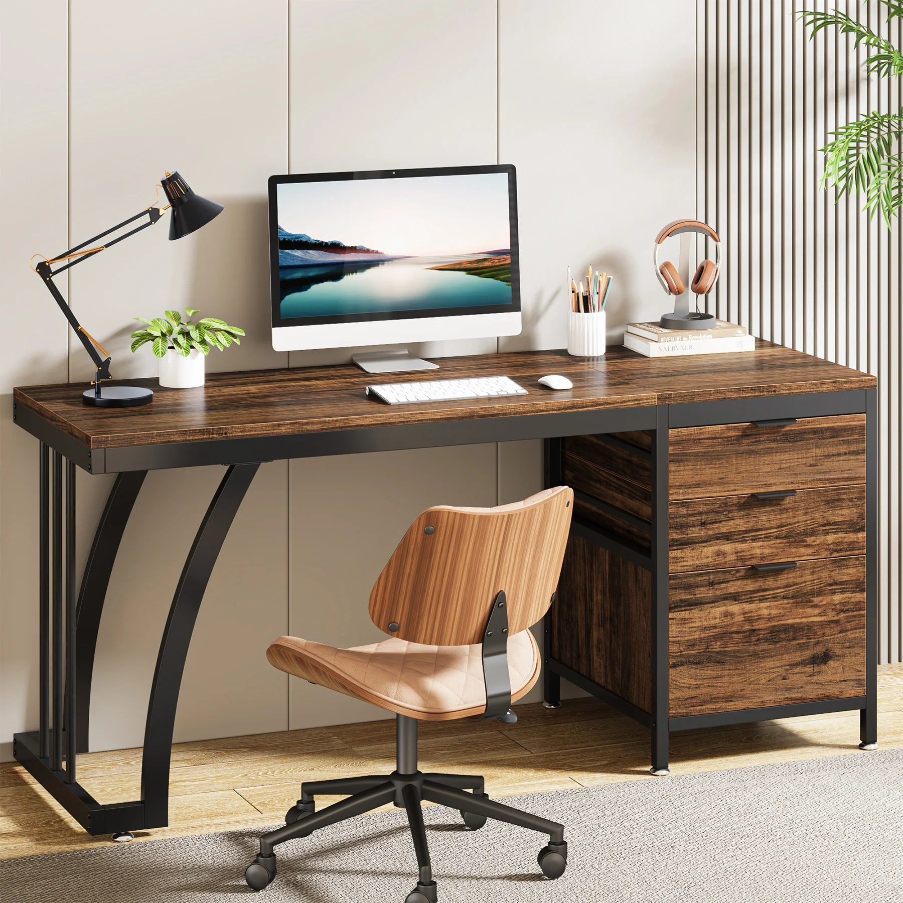 Wooden office desk with computer setup, chair, and decor in a room.