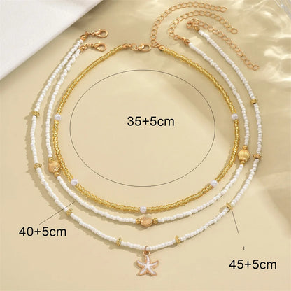 Bohemian Beaded Starfish & Shell Pendant Necklace – Layered Summer Beach Jewelry for Women