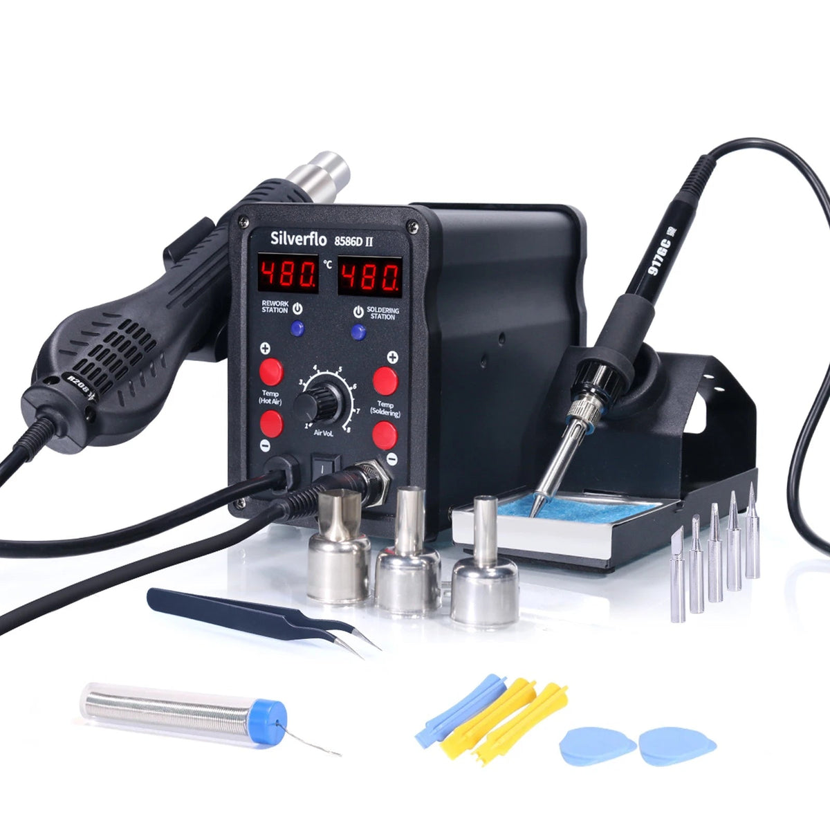 Silverflo ESKIMO II electronic soldering station kit with a black control unit, soldering iron, stand, multiple metal tip attachments, tweezers, and blue/yellow cleaning accessories on a white background, with Silverflo branding and country flags at the top.