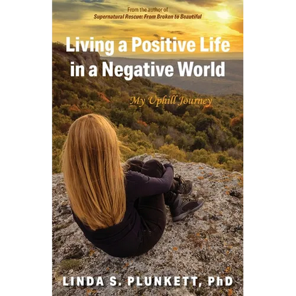 Living a Positive Life in a Negative World: My Uphill Journey - Paperback