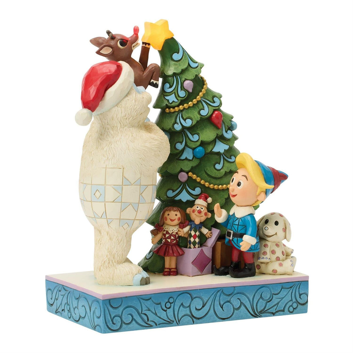 Bumble Holding Rudolph by Tree