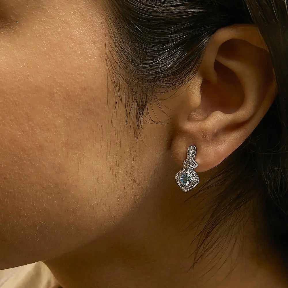 Blue Topaz & Diamond Accent Twist Dangle Earrings in Sterling Silver – Cushion Cut