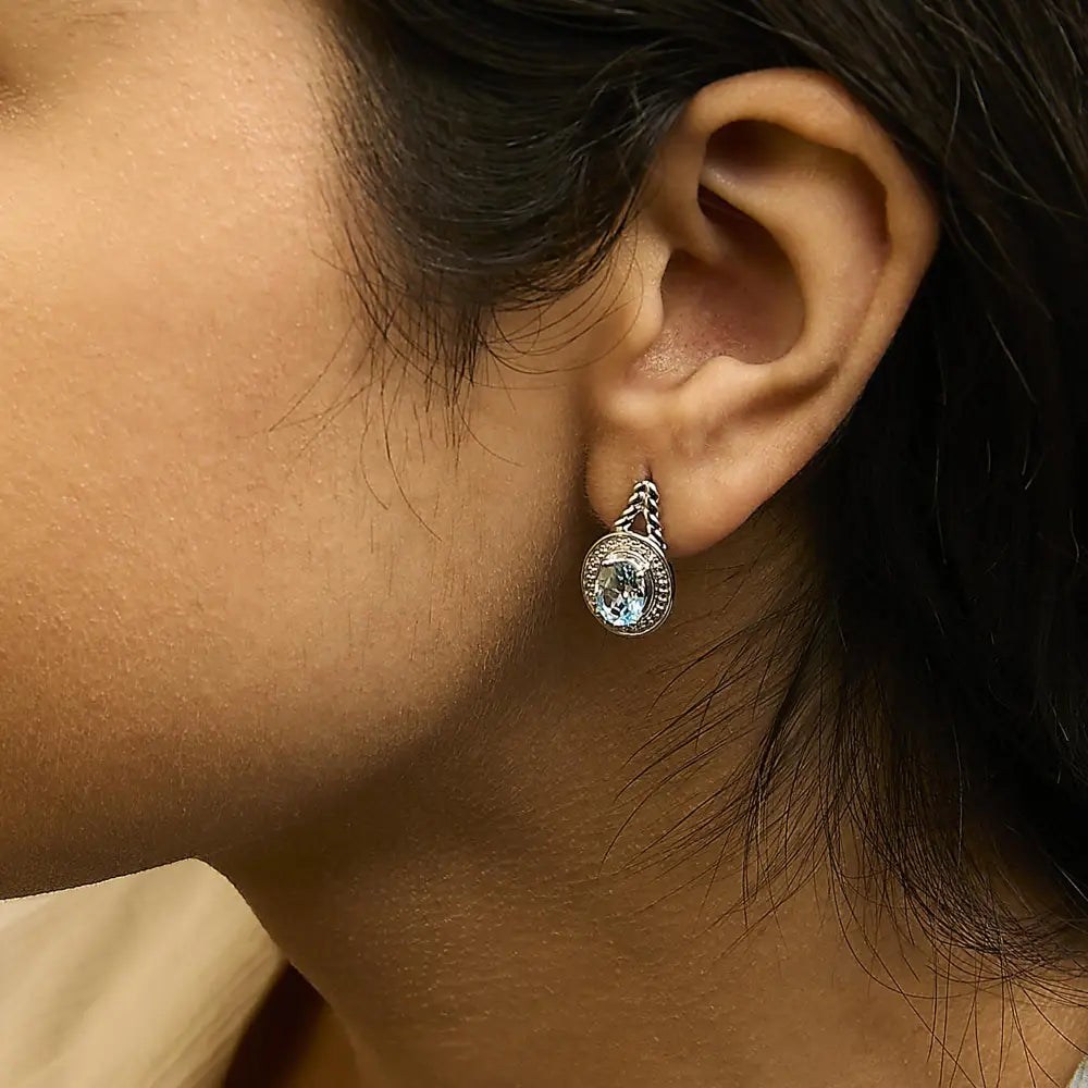 Blue Topaz & Diamond Halo Twist Drop Earrings in Sterling Silver – Oval Cut