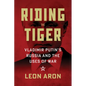 Riding the Tiger: Vladimir Putin's Russia and the Uses of War - Hardcover