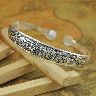 Handcrafted Tibetan Miao Silver Artisan Bracelet for Boho Fashion