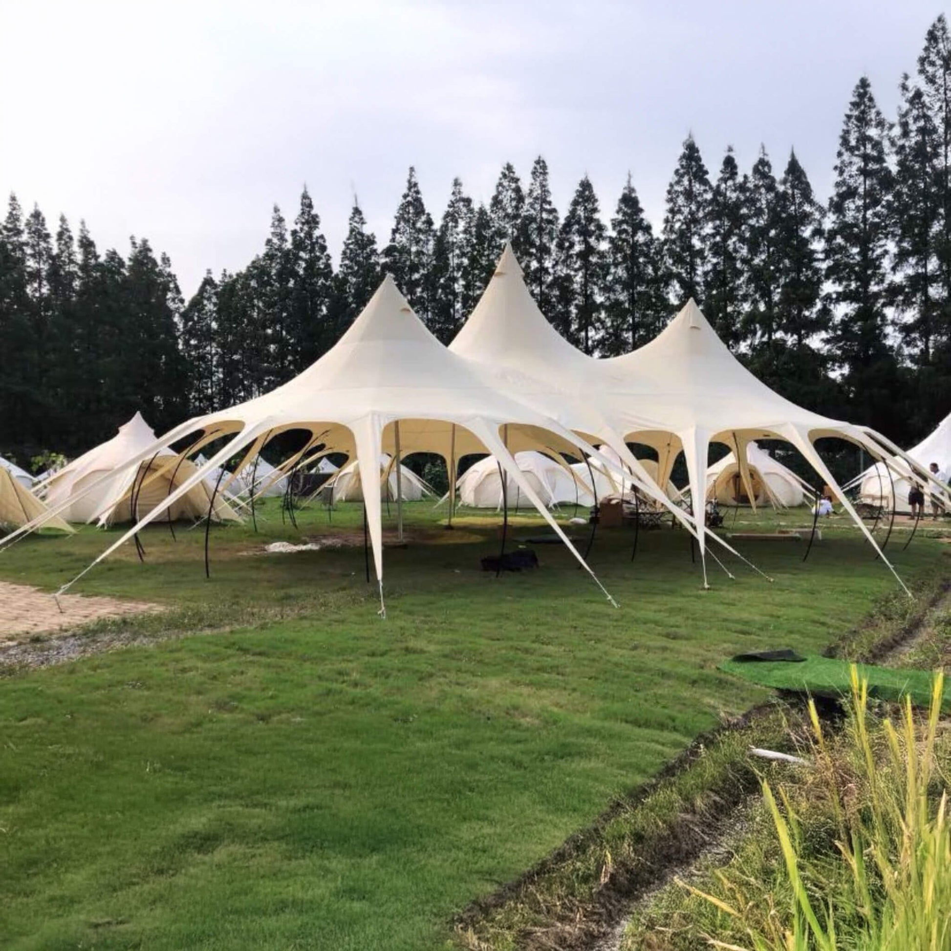 Extra large outdoor rain tarp canopy over camping area