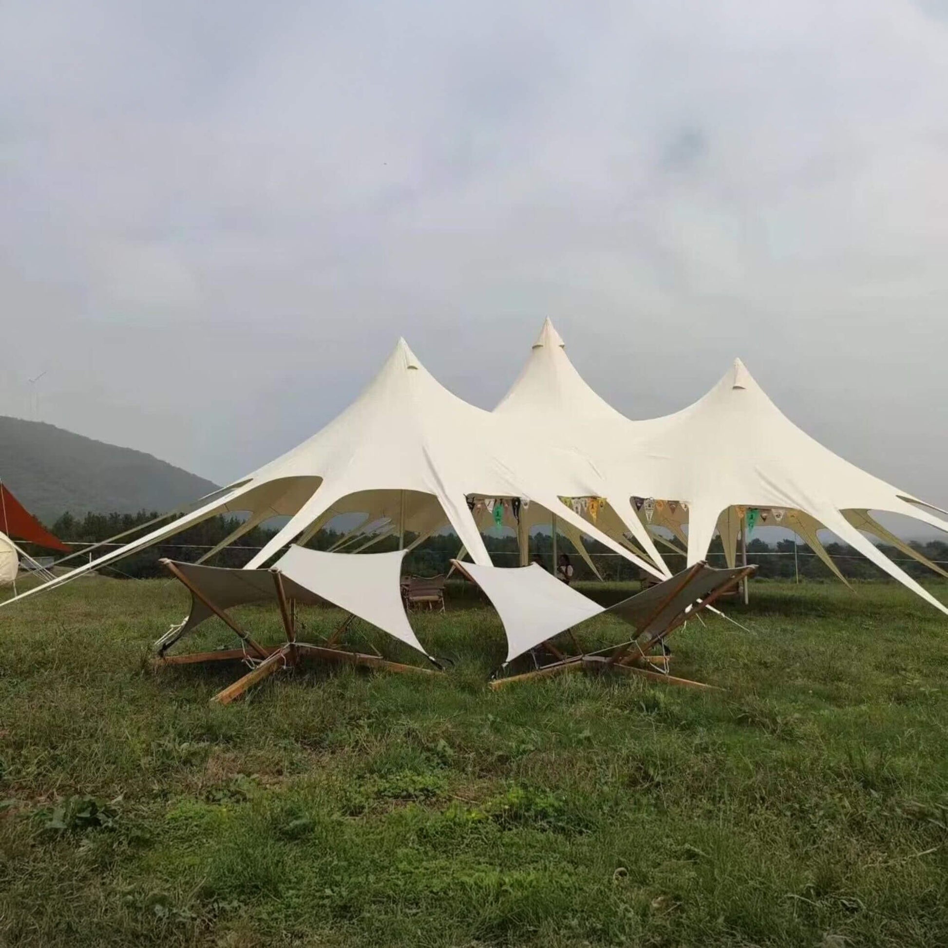 Extra large waterproof outdoor rain tarp canopy at camping site