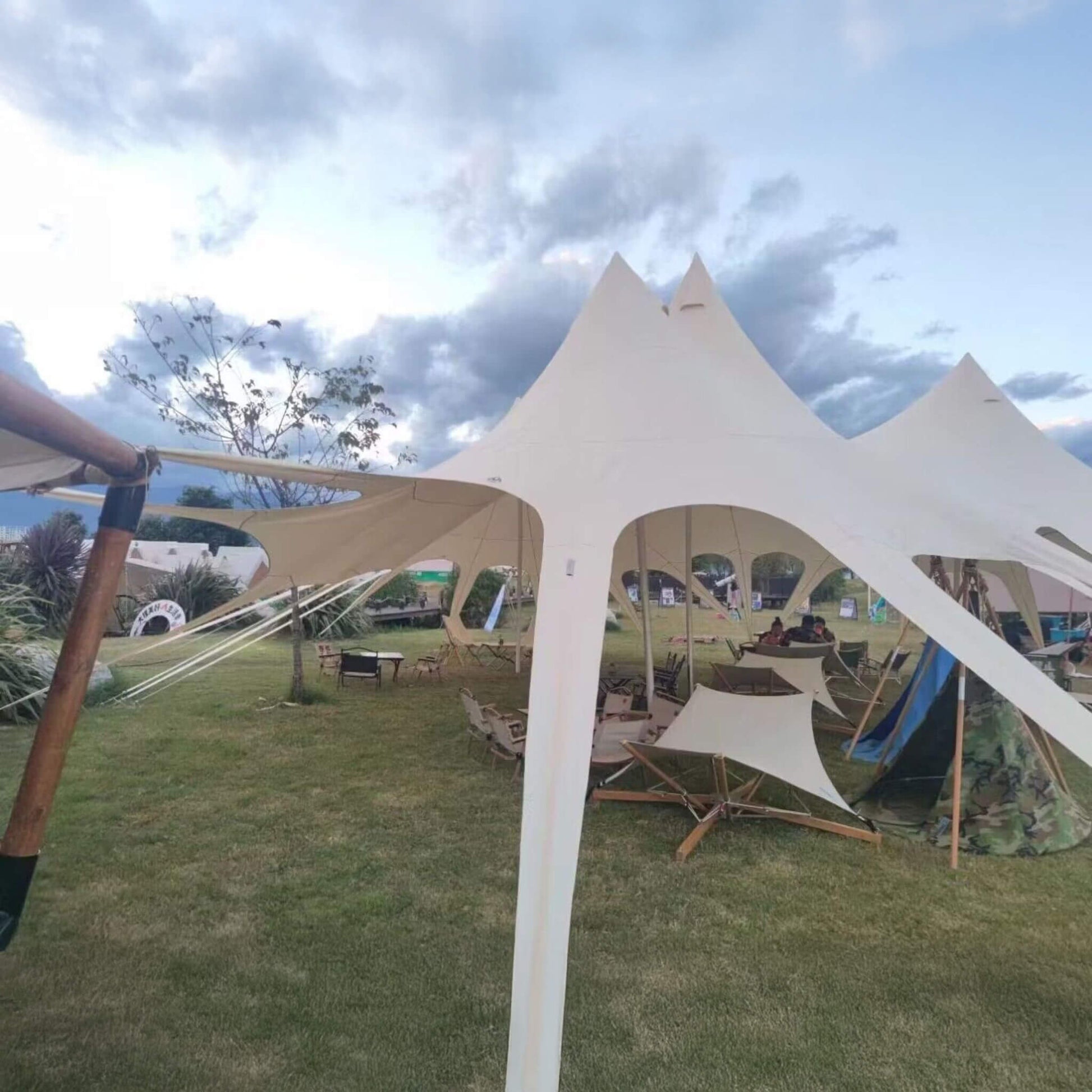 Front view of extra large portable outdoor rain tarp canopy