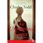 An Unmarked Grave: A Bess Crawford Mystery - Paperback