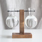 Wooden Frame Holding Glass Vases
