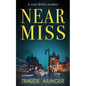 Near Miss: A cozy British mystery - Paperback