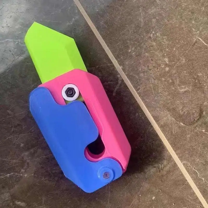 Pink and Lime Radish Knife Gravity Cub Toy