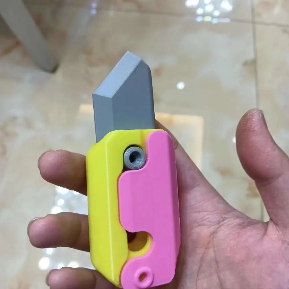 Pink and Lime Radish Knife Gravity Cub Toy