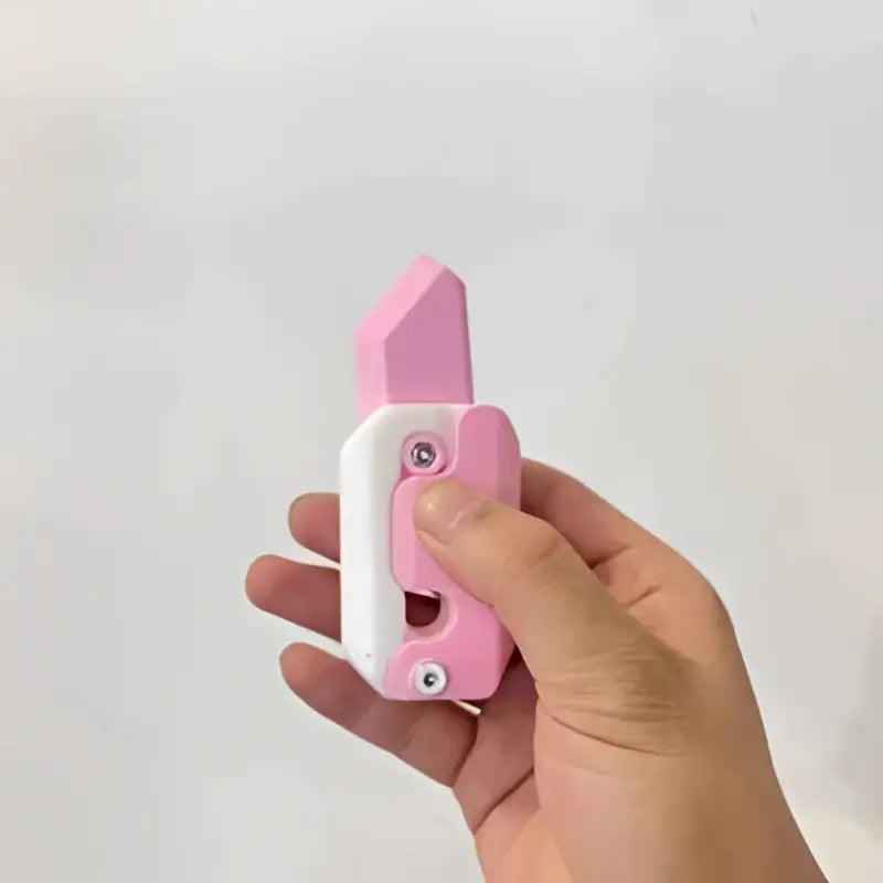 Pink and Lime Radish Knife Gravity Cub Toy