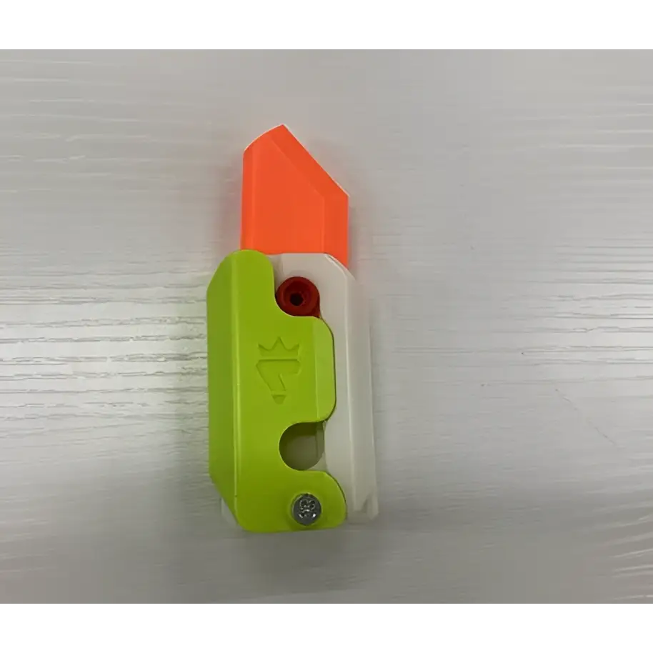 Pink and Lime Radish Knife Gravity Cub Toy