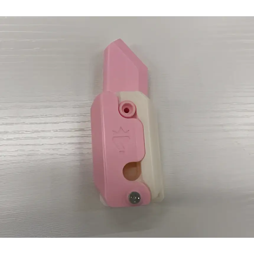 Pink and Lime Radish Knife Gravity Cub Toy
