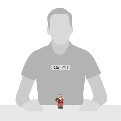 Santa Sitting on Gifts