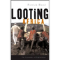 Looting Africa: The Economics of Exploitation - Paperback