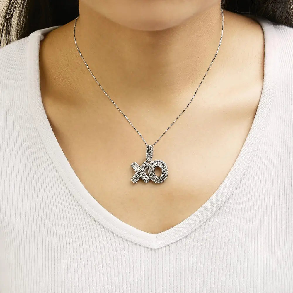 Sterling Silver 1/4 Cttw Diamond Pavé XO Pendant Necklace on 18 Inch Chain