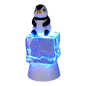 Penguin Sitting on Color-changing Lighted Icecube -