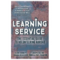 Learning Service: The essential guide to volunteering abroad - Paperback