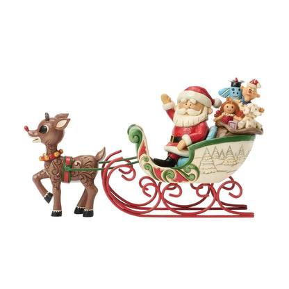 Rudolph pulls Santa in a Sleigh Figurine